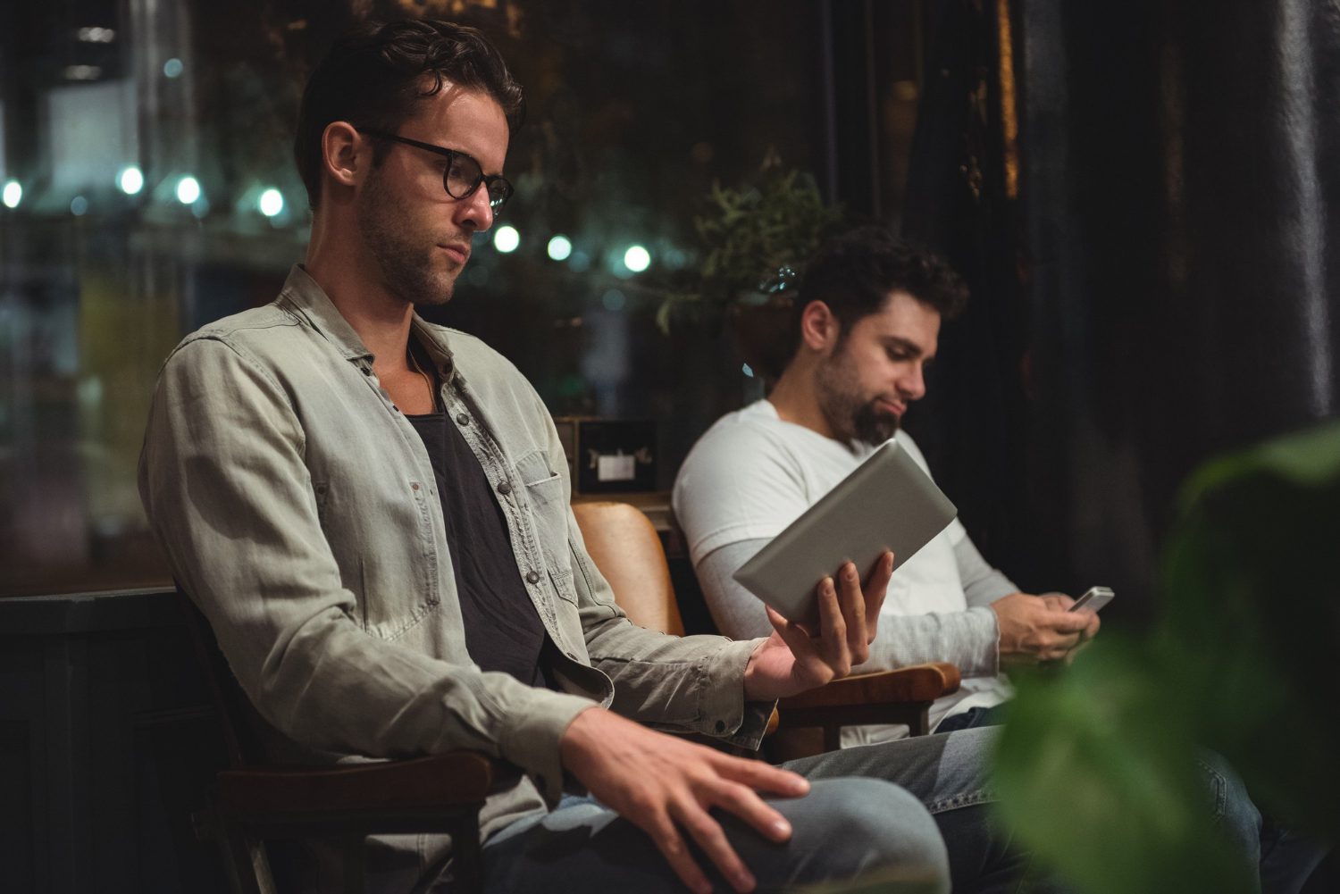 Salon clients using a digital tablet