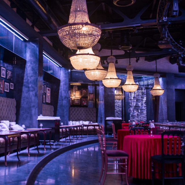 Luxury restaurant grill bar interior with chandeliers