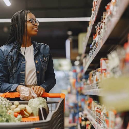 Woman shopping for vegetables